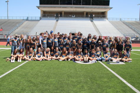 NHS poses for photo after helping with Special Olympics.