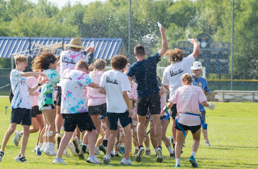 Seniors celebrate after winning powderpuff four years in a row.