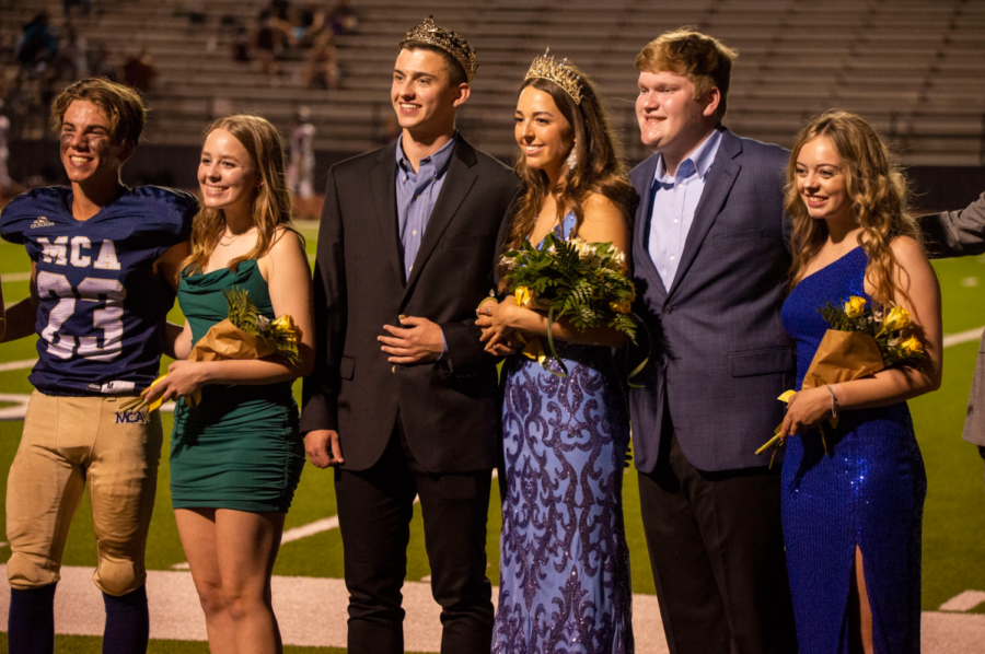 Homecoming King Bobby McWard and Homecoming Queen Abby Thomas pose after being crowned.