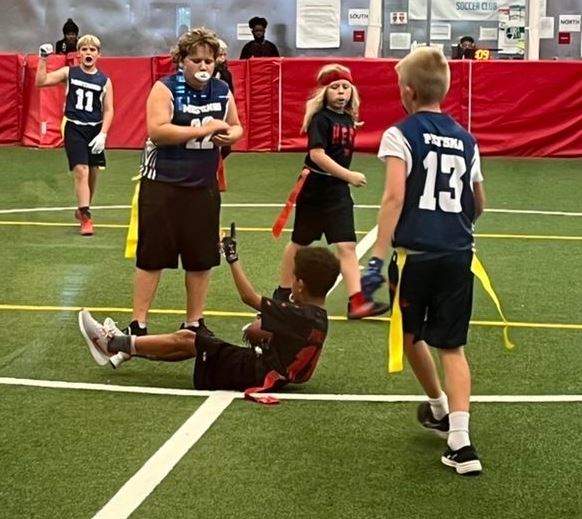 5th grade Football player makes a play.