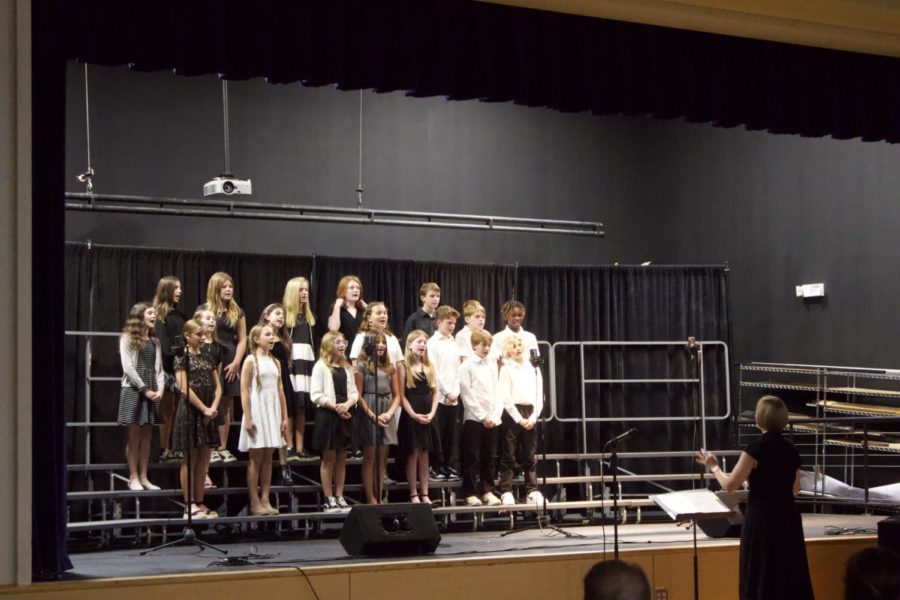 The 6th grade choir begins the concert.