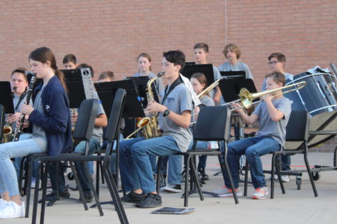 Middle school band playing for their mini-concert.