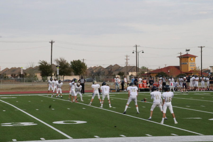 The Mustangs kick the ball off.