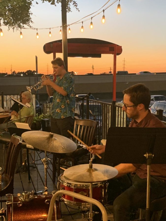 Band+plays+as+the+sun+sets.