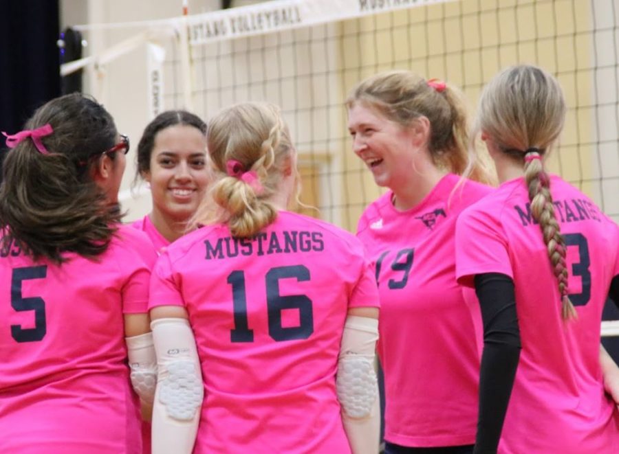 Varsity+Volleyball+wears+pink+in+honor+of+Breast+Cancer+Awareness+Month.+