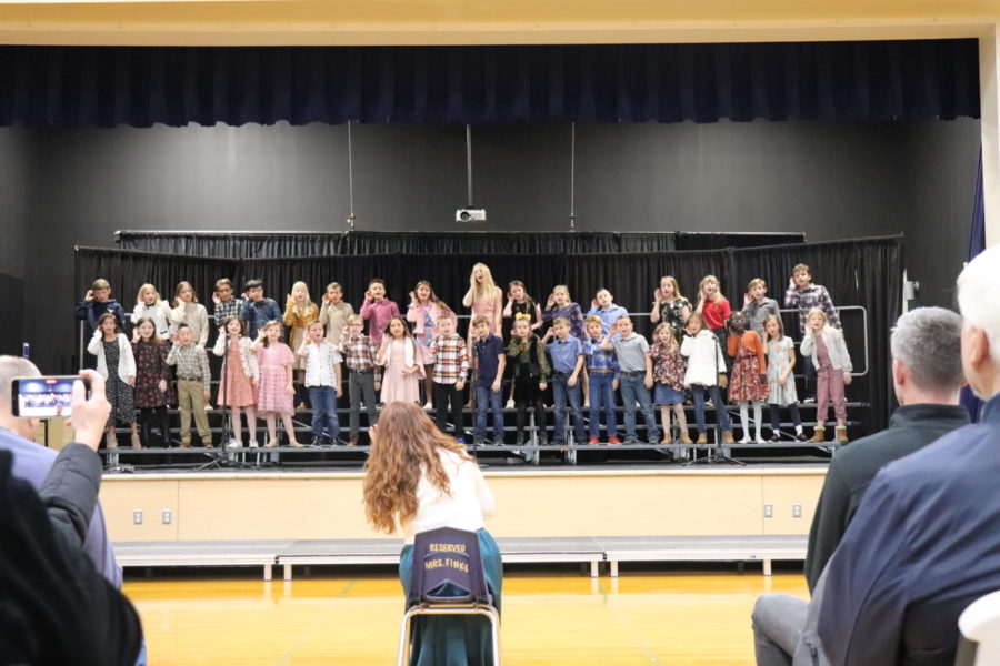 Fourth Grade sings a song for the Lower School Grandparents Day. 