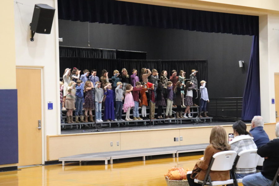 Students Preform the actions for their unique song