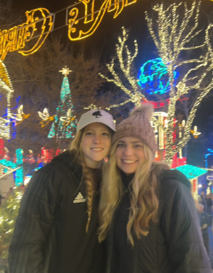 Hannah Doshier posing for a picture in front of silver dollar city lights show