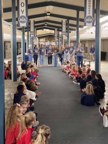 MCA Vocal Ensemble sings to the Lower School. 
