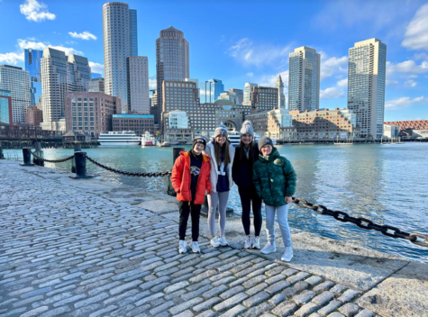 The Nordhaus family walks through Sea Port District in Boston.