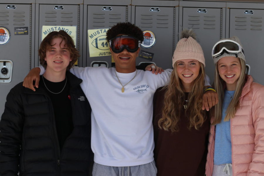 Seniors Tyler Swearingen, Brooke Jensen, Lexi Pogue, and junior Noah Wheeler on ski trip day. 