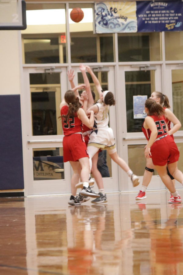 Junior, Emily Barnhill gets fouled as she drives in for the layup.