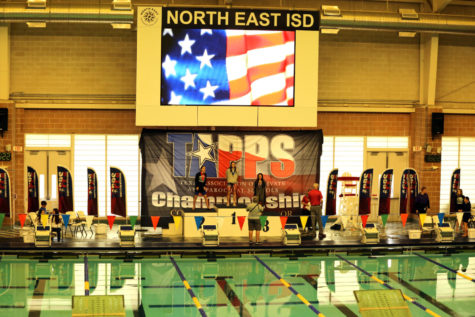 Tiffany Nordstrom stands at the podium after placing third.