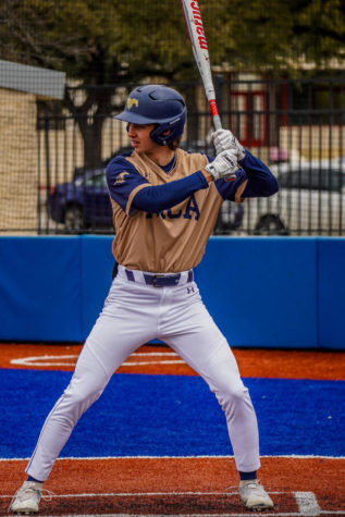 Junior Connor Jarzombek stands in the box ready to hit.