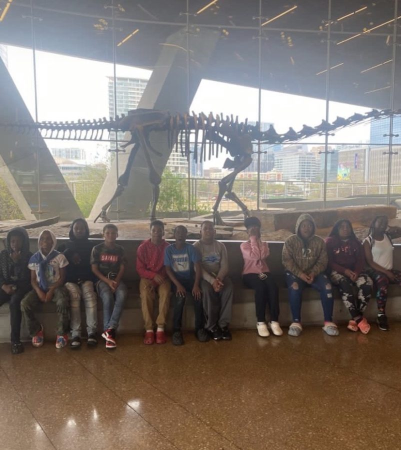 The Arkansas Dream Center kids pose for a picture and the Perot Museum