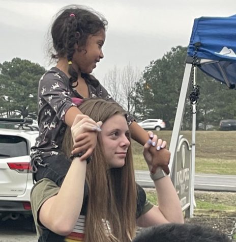 Senior Josie Allen with the little kids in Arkansas.