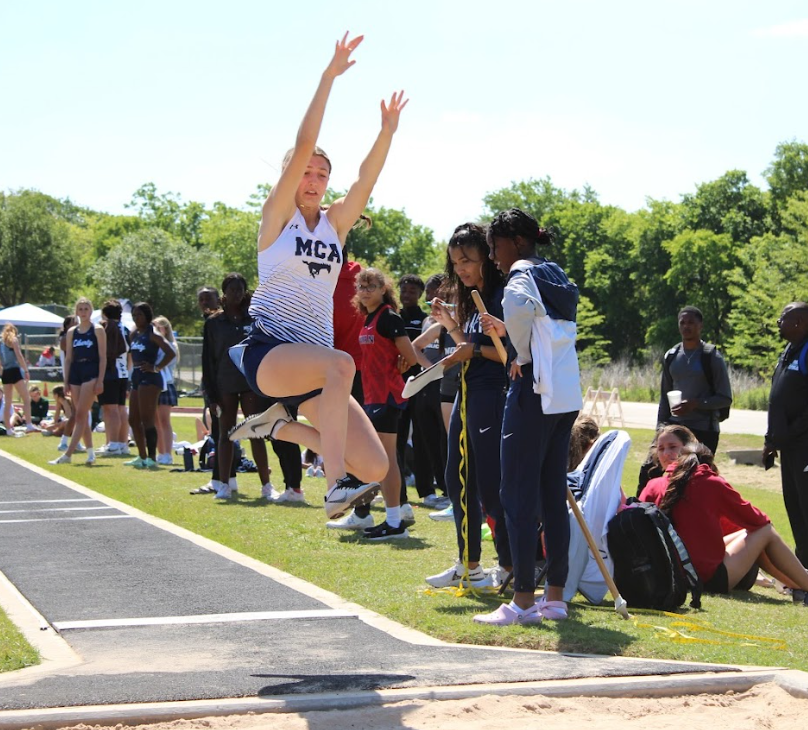 Sophomore Kadence Ackmann competes in long jump. 