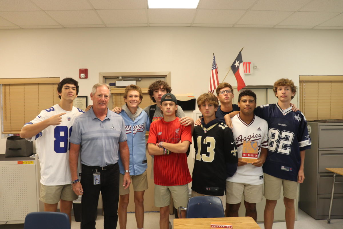 Freshman Boys and Teacher Gerald Brence pose on Jersey Day.