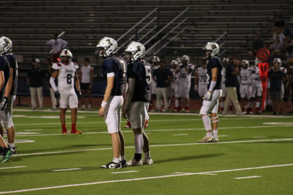 The Mustang offense waits for the next play