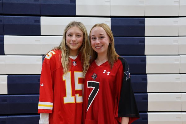 Eighth graders Petra Westra and Cana Heckadon pose for a picture on jersey day.