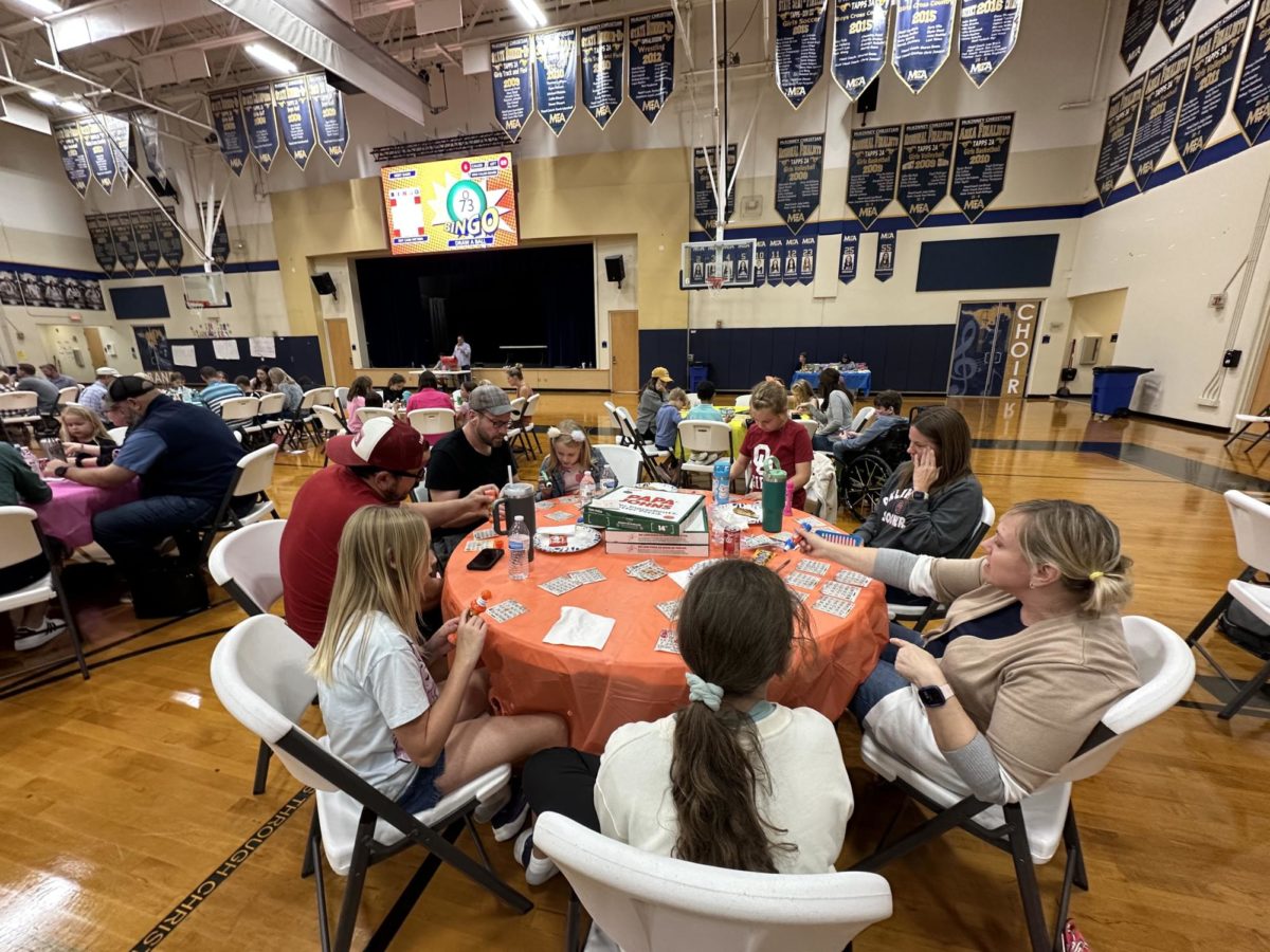 Students and families compete in games of bingo.