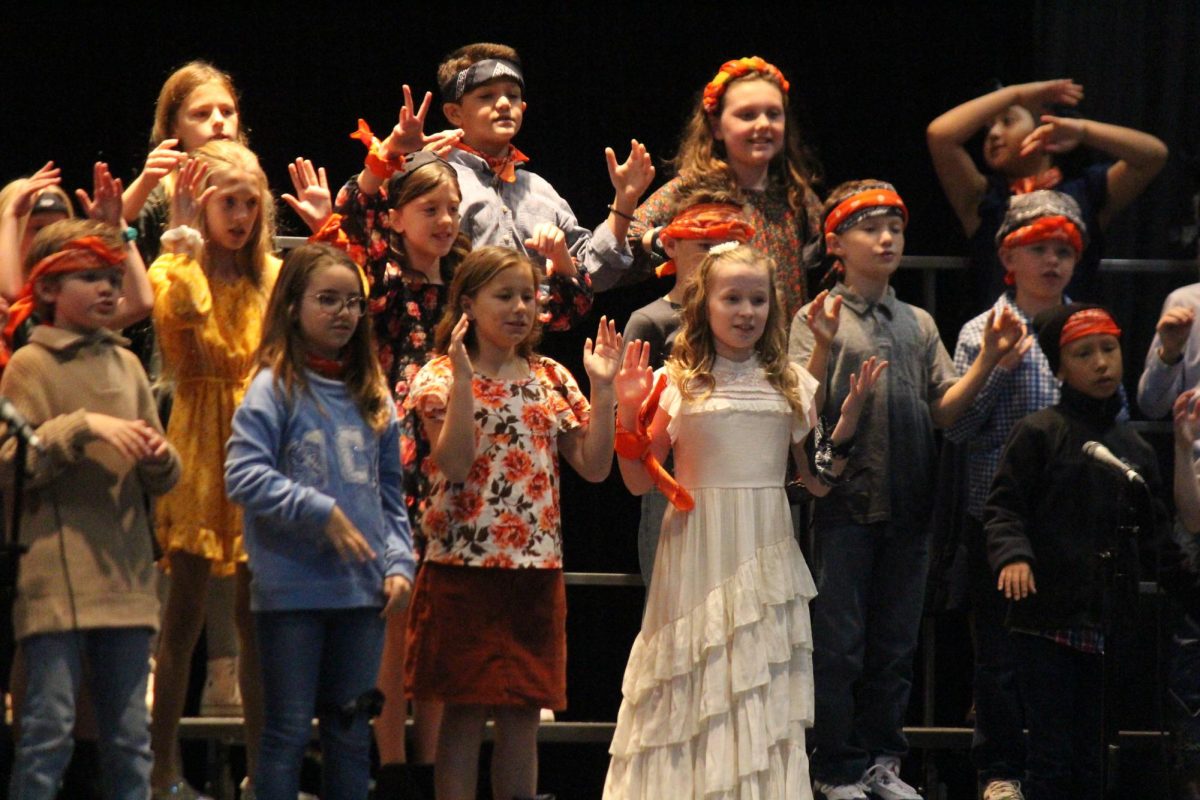Lower School students perform for their families.