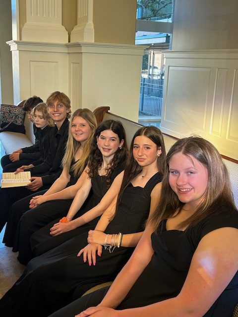 Middle school choir students waiting to perform.