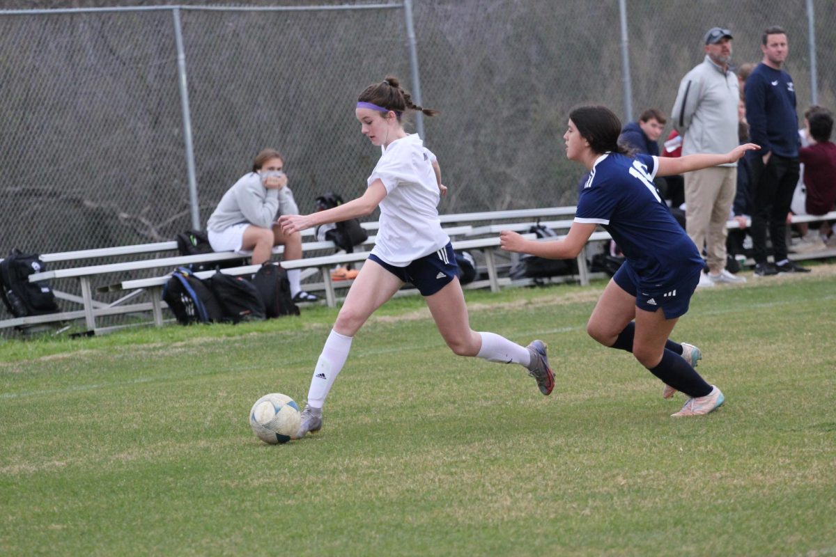 Sophomore Sadie Zbranek takes on the defender. 