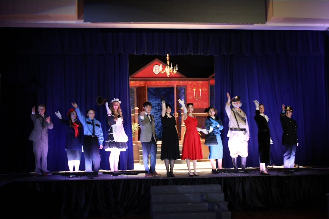 Cast waving to audience at the end of the play