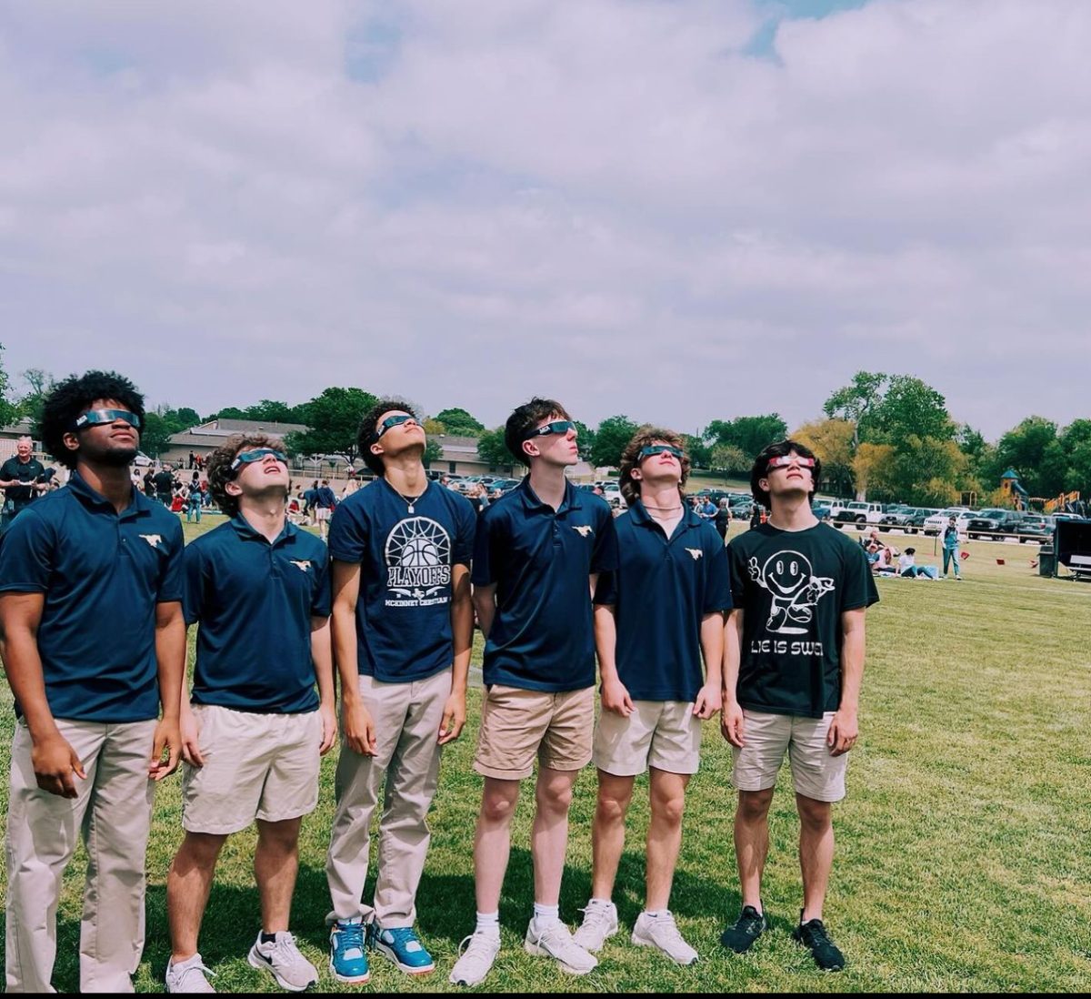 Junior boys watching the eclipse 