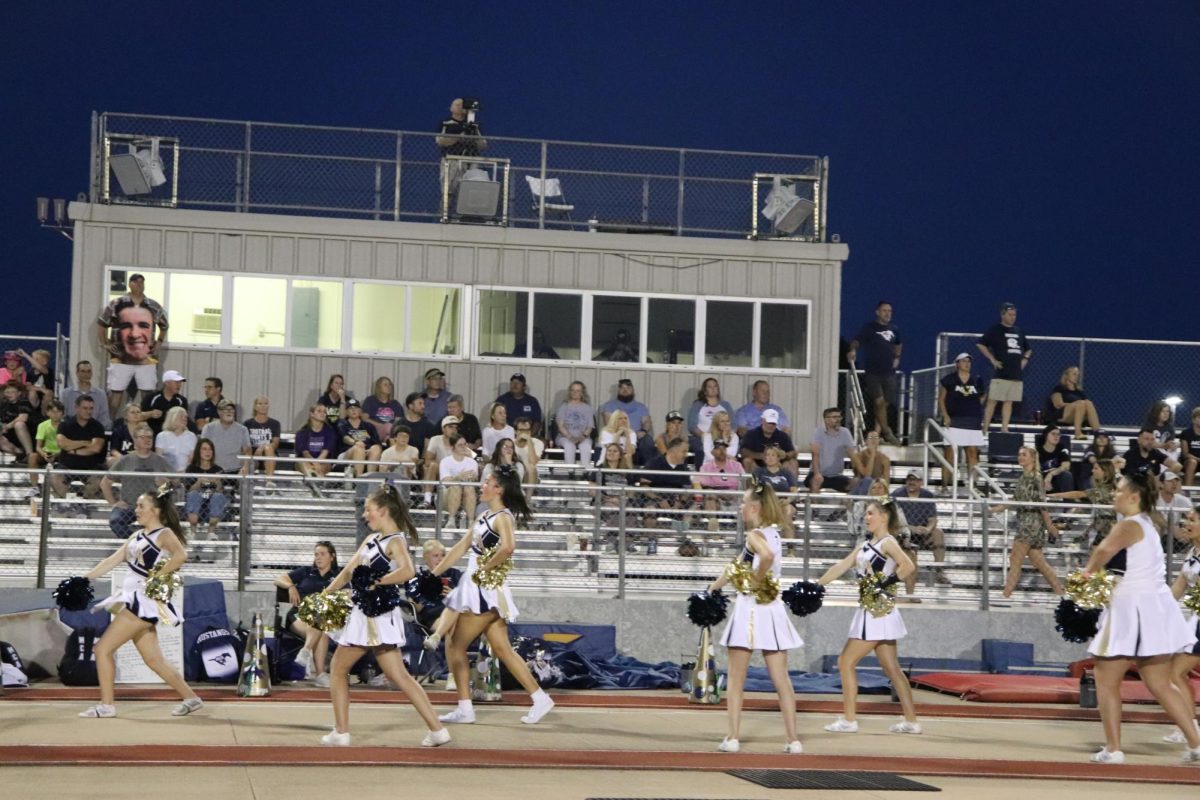 Mustang Cheer Team Entertaining the stands