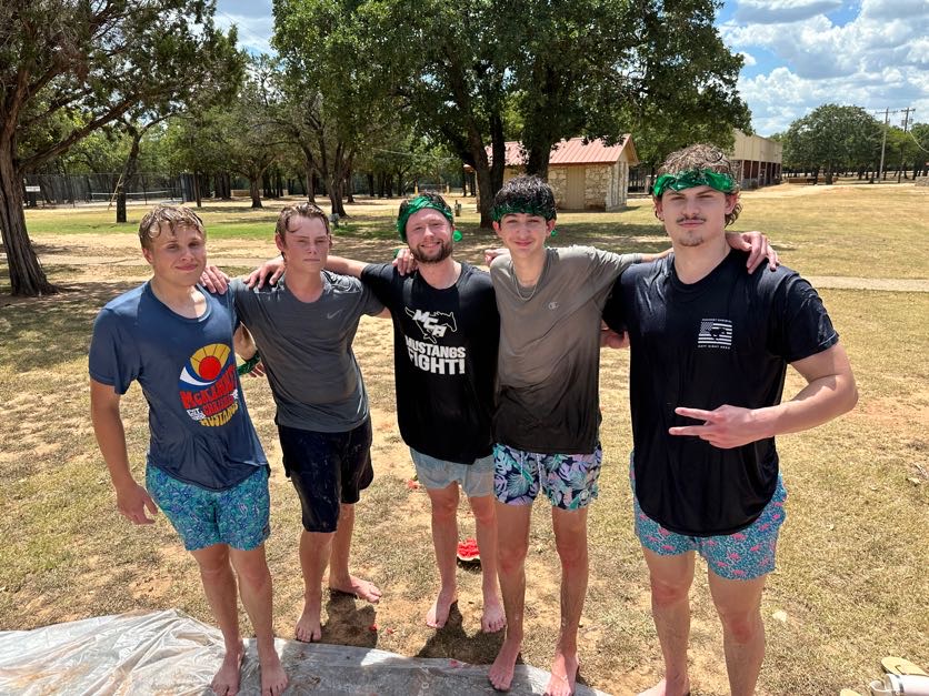 Seniors Cash Harrison, Luke Mohler, Gavin Fletcher, Hayden Lorenzo and Carter Kincheloe group together for a photo during the group games. 