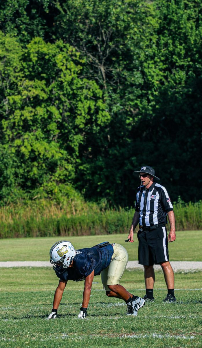 Sophomore Corey Sizemore lines up for the play.