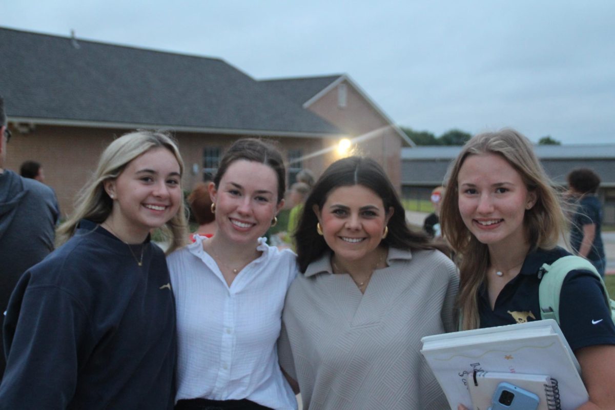 Junior Maddie Labunski, Sophmore Karis Mejan, Ms.Oberdieck, and Mrs.Matthews gather together to take a picture after the event