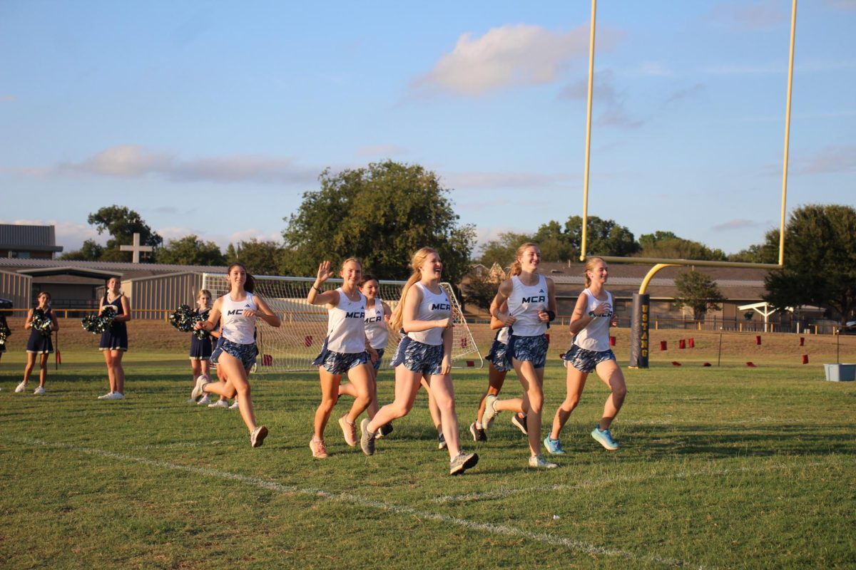 The MCA XC team runs in Highlight Run.