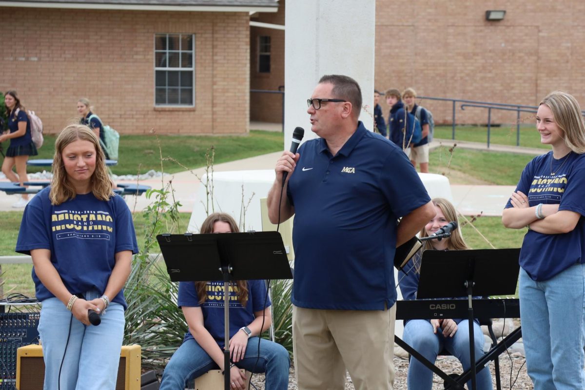 Chris Hydock, Director of Spiritual Formation, speaks to the students about the devastating events of 9/11.