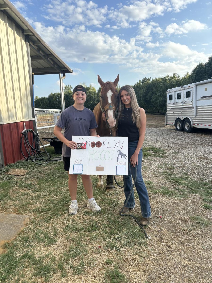 Sophomore Jude Bleecker asks Sophomore Brooklyn Adams.