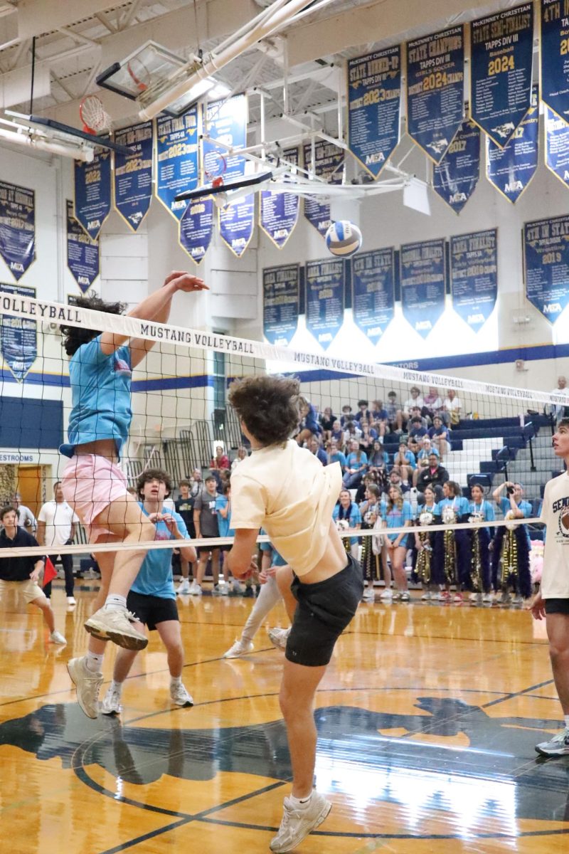 Sophomore boys play against Senior boys in volleyball.