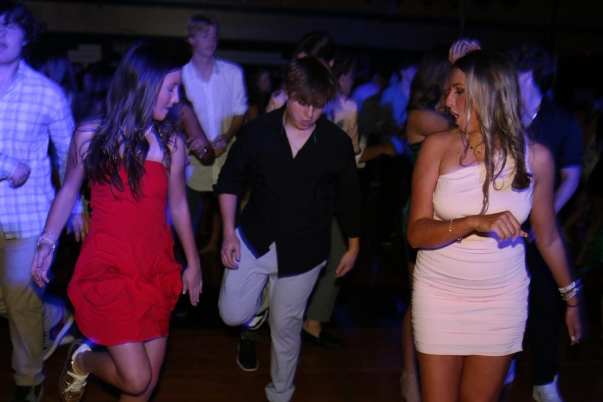 Sophomores Maggie Emley, Brooklyn Adams, and Jude Bleecker dance the night away. 