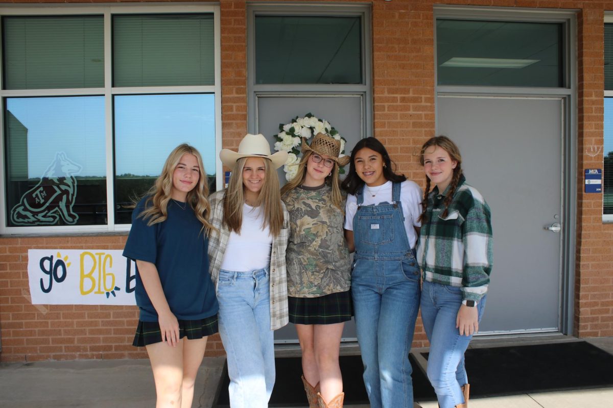 Freshman girls pose for a picture on Country vs. Country Club day.