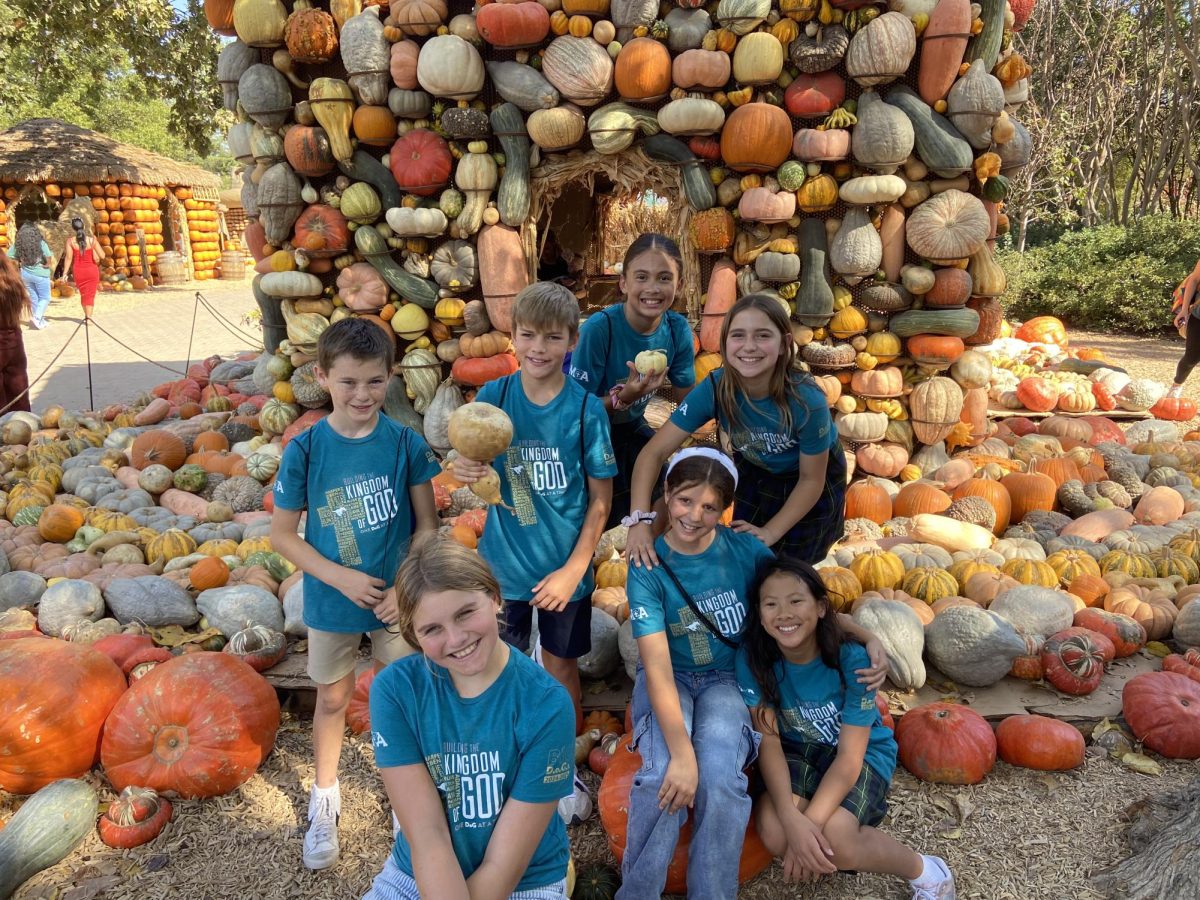 Students smile for a picture.