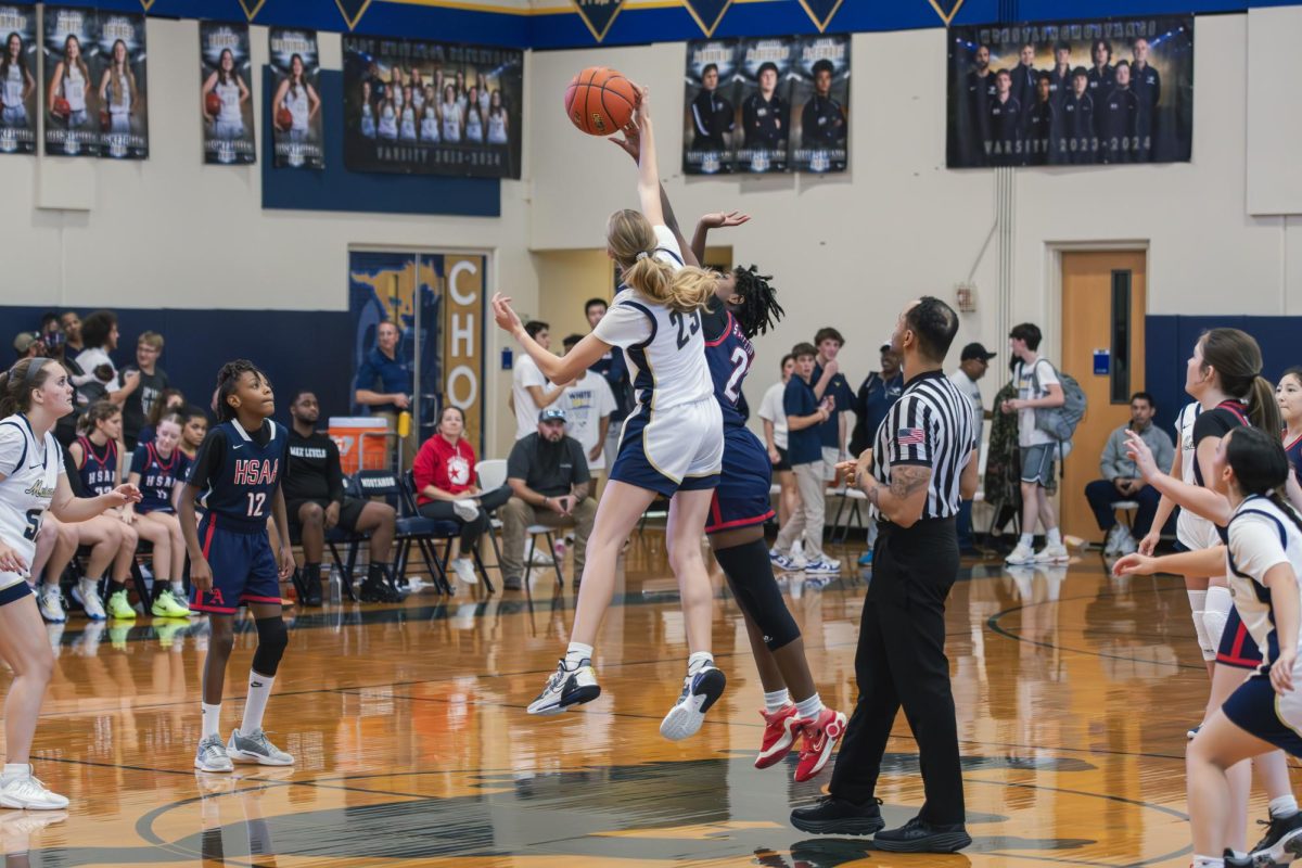 Junior Dylan Neuner gets the jump ball.