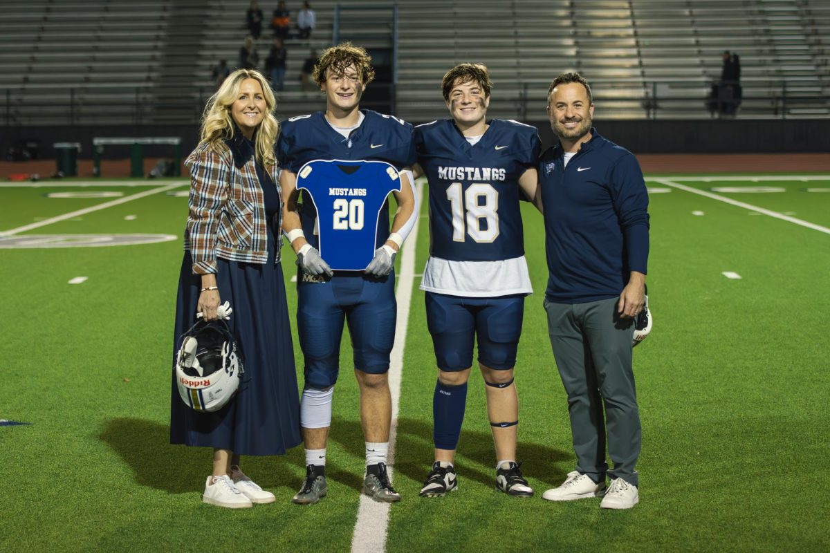 Senior Evan bleecker gets recognized on Senior Night.