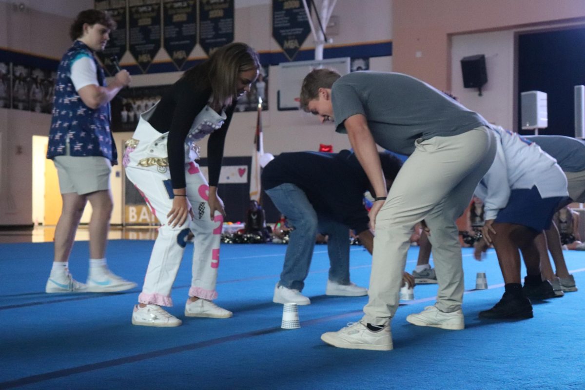 Students compete in the cup game