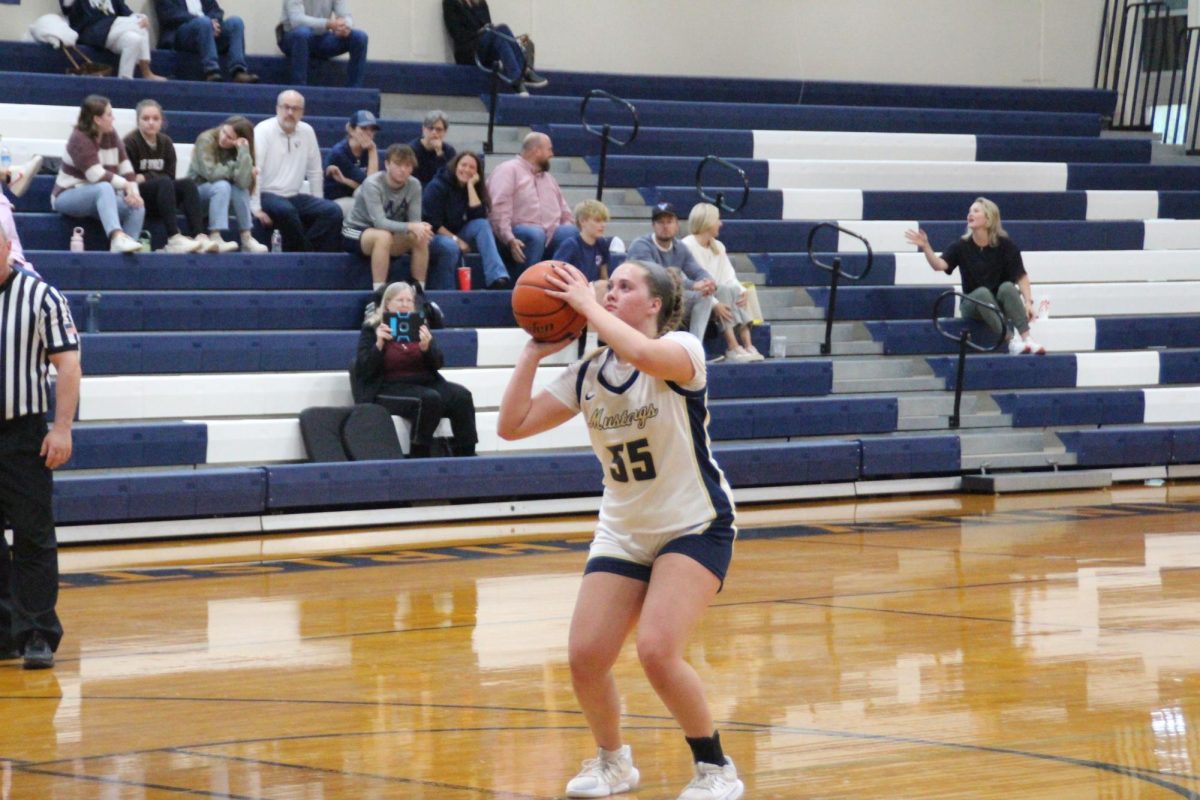 Senior Hannah Masingale shoots ball.