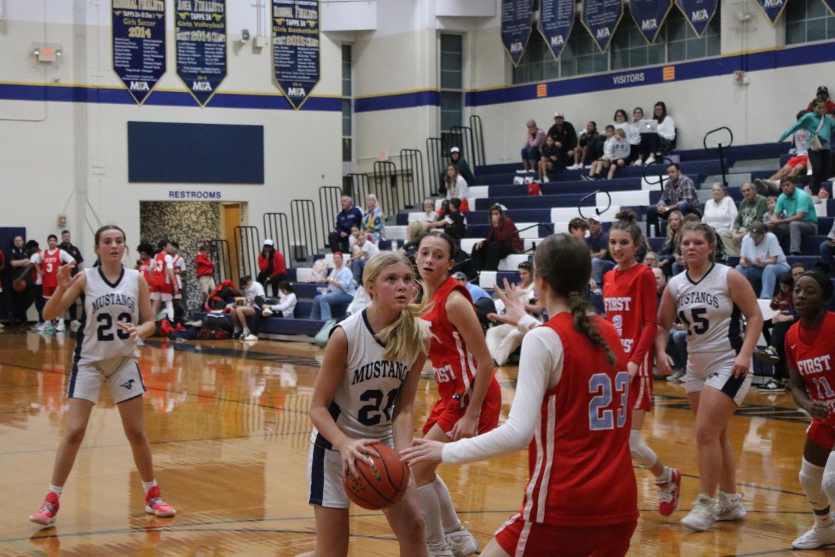 Seventh grader Jada Westra gets ready to shoot the ball. 