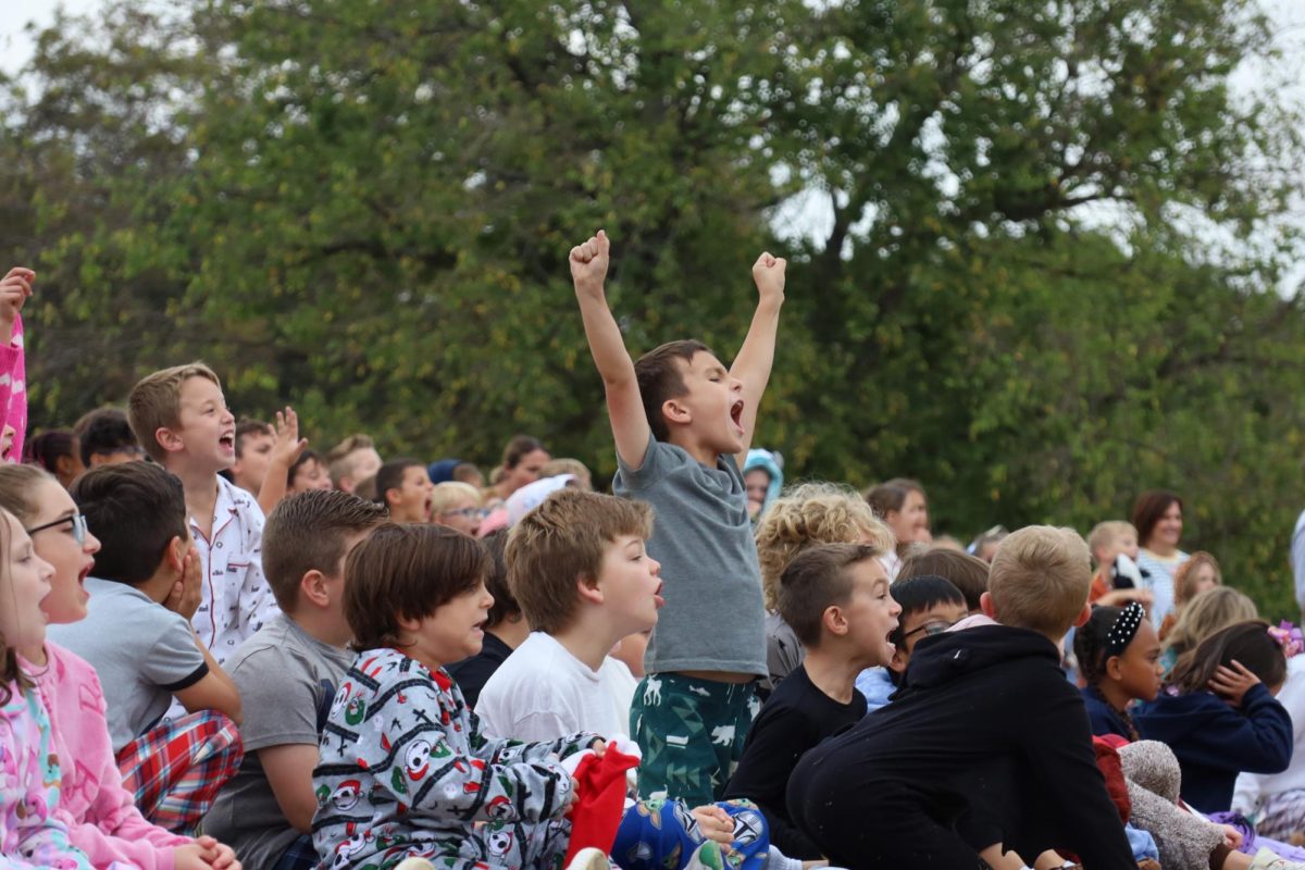 Lower School students cheers in excitement.