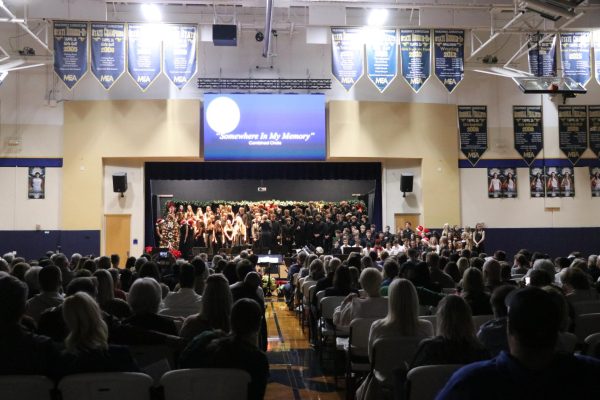 The seventh and eighth grade choir sings for the audience.