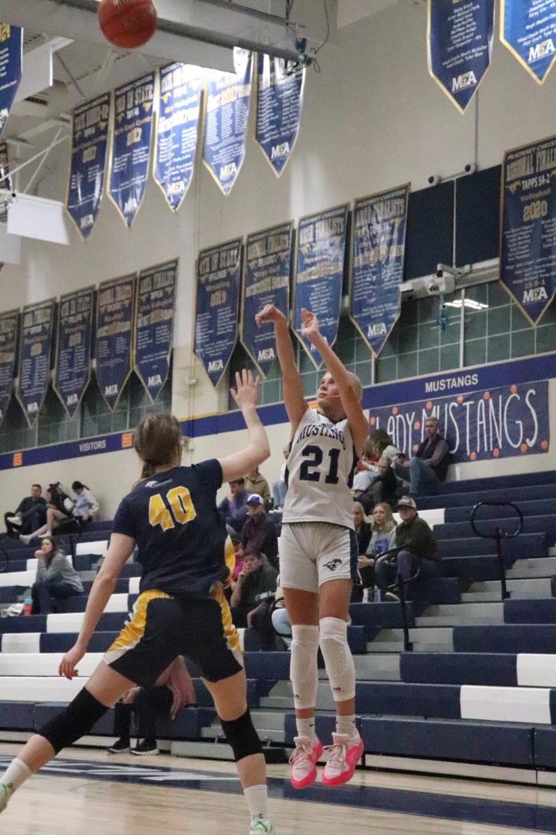 Seventh grader Jada Westra shoots from for three points. 