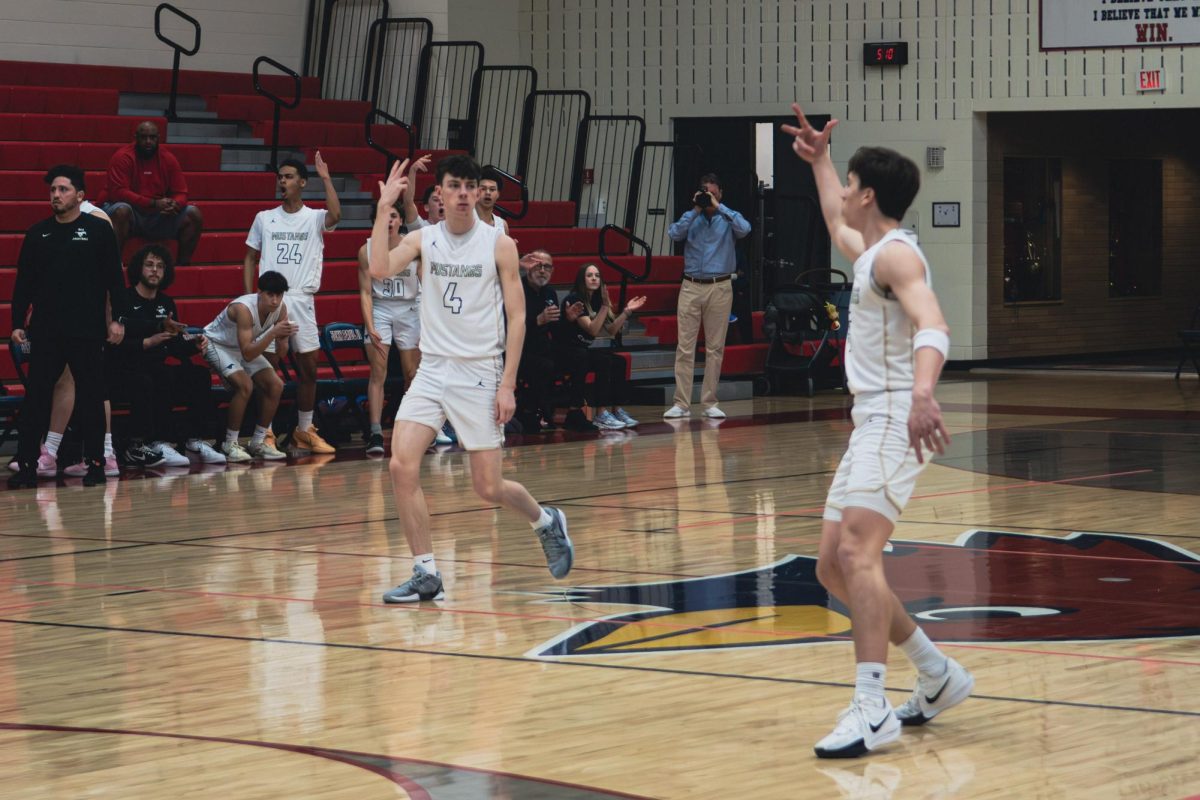 Clark celebrates after a three-pointer.